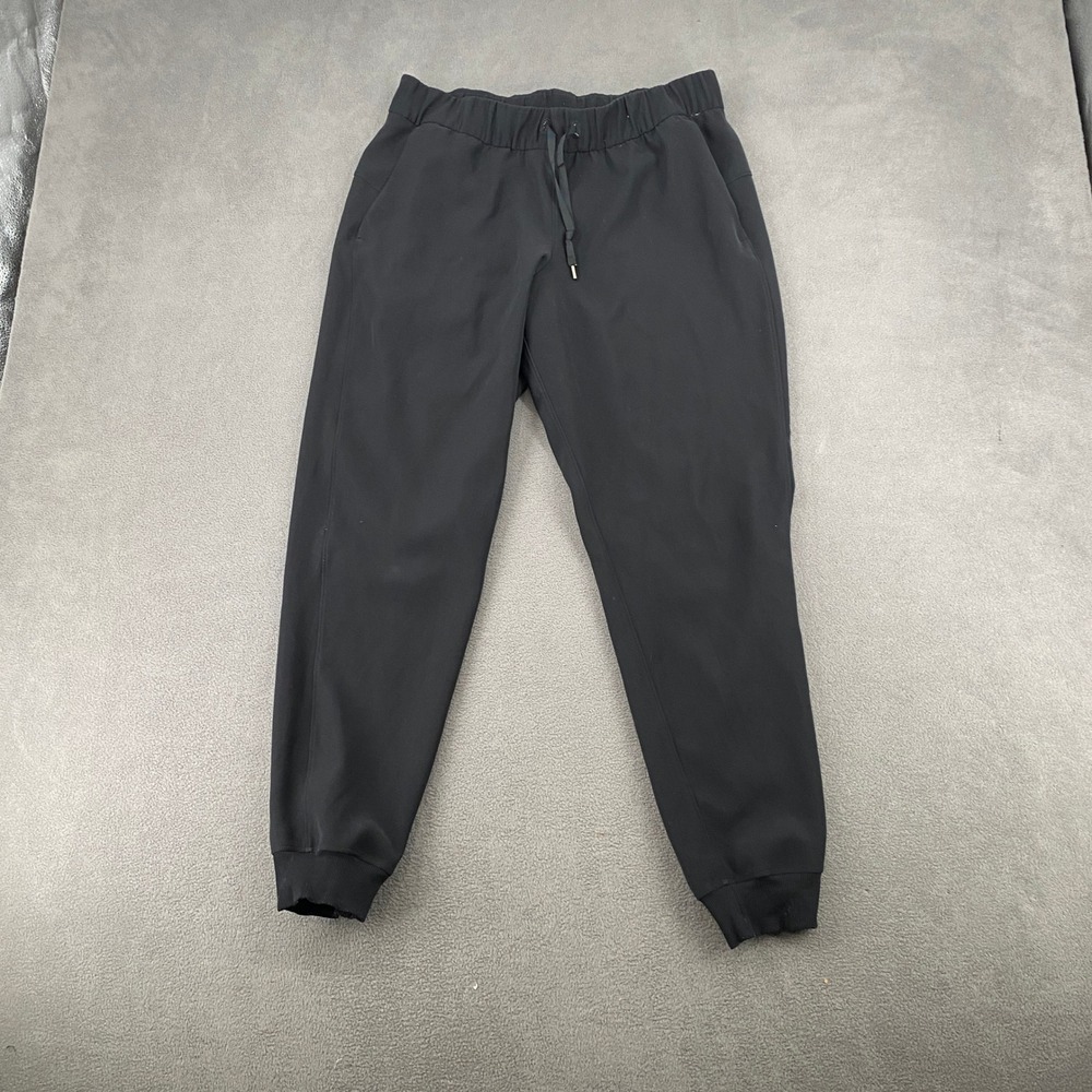 Lululemon On the Fly Jogger Black Luxtreme Travel Pants Size 8 LW5BZDS